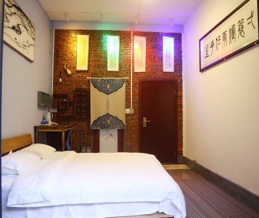 Zhaohuaxishi Youth Hostel Kuangcsou Kültér fotó